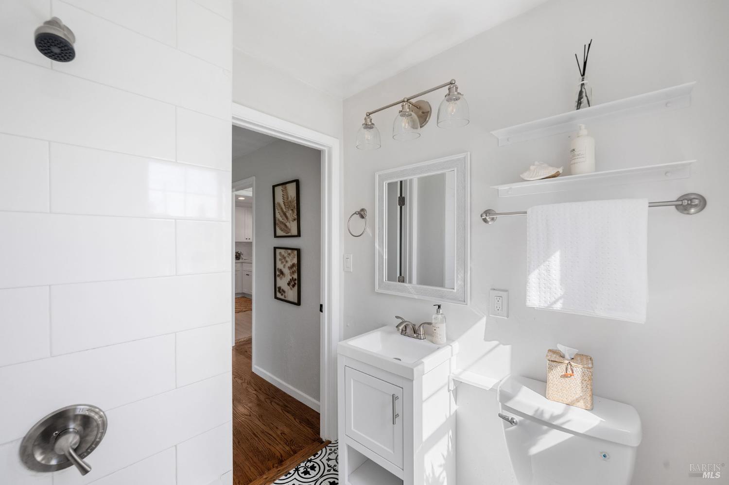 2005 Adrian Street Napa, CA 94559 - Photo 25 of 32 a bathroom with a sink toilet and shower