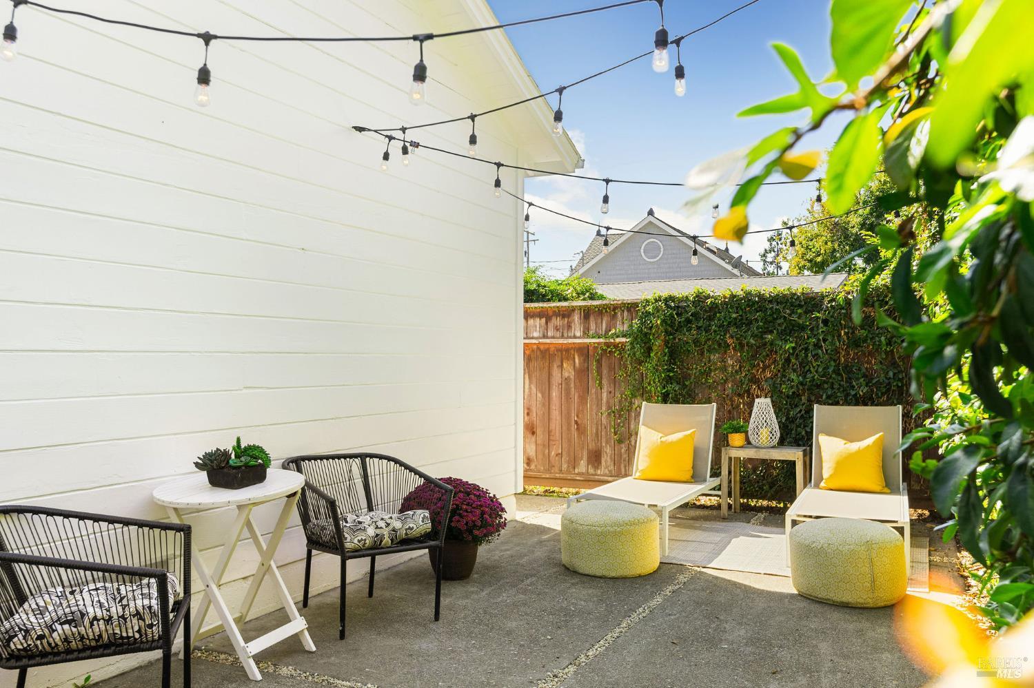 2005 Adrian Street Napa, CA 94559 - Photo 29 of 32 a view of a patio with chairs and potted plants