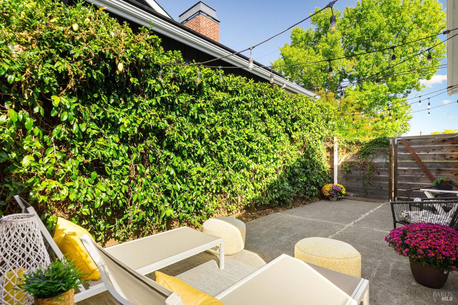 2005 Adrian Street Napa, CA 94559 - Photo 30 of 32 a backyard of a house with outdoor seating