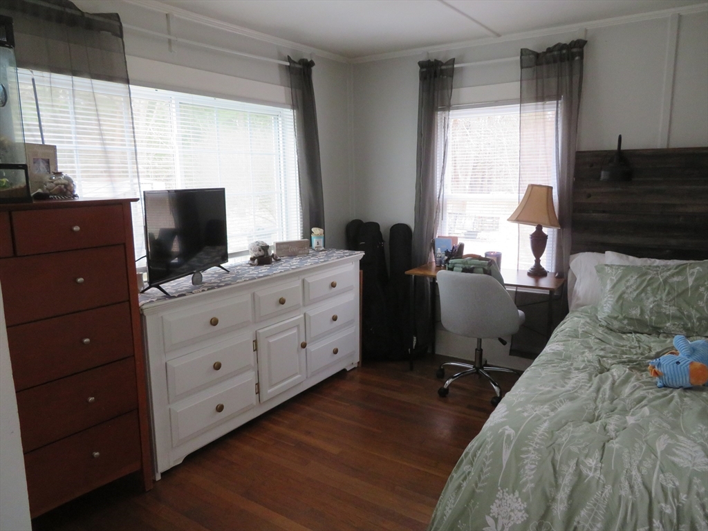 34 R Pine Street Norton, MA 02766 - Photo 15 of 20 a view of a workspace with furniture and a window