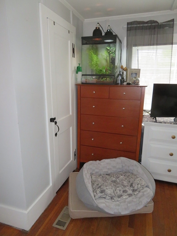 34 R Pine Street Norton, MA 02766 - Photo 16 of 20 a living room with a bed furniture and a flat tv screen