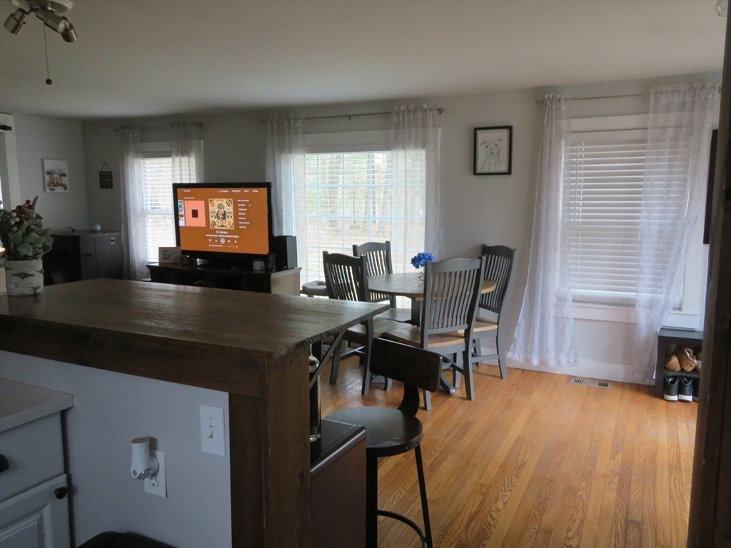 34 R Pine Street Norton, MA 02766 - Photo 8 of 20 a living room with furniture and a flat screen tv