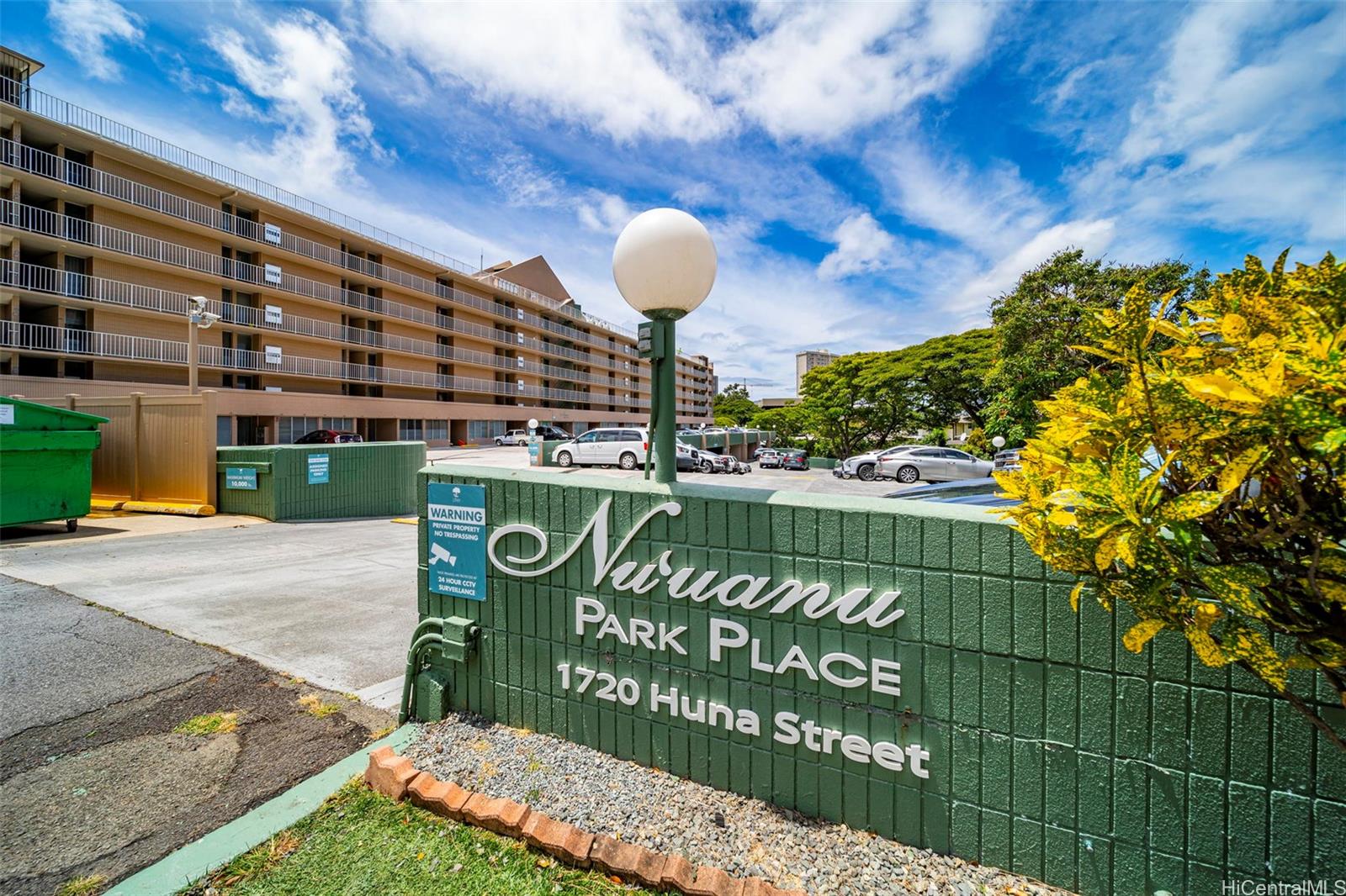 1720 Huna Street, Unit B106 Honolulu, HI 96817 - Photo 1 of 1 a sign on the side of a building