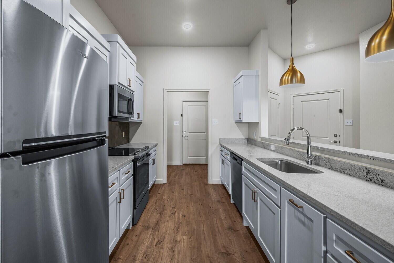 7012 40th Street, Unit A Lubbock, TX 79407 - Photo 8 of 19 7002 40th St B grey counters-6