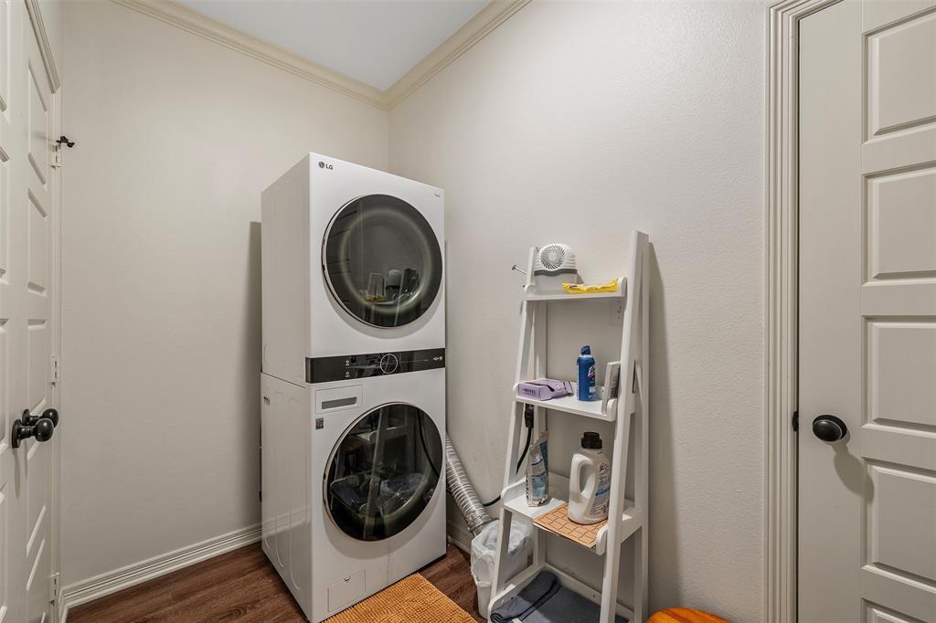 1672 Alamo Xing Road Tyler, TX 75701 - Photo 19 of 25 a view of a storage and utility room with washer and dryer