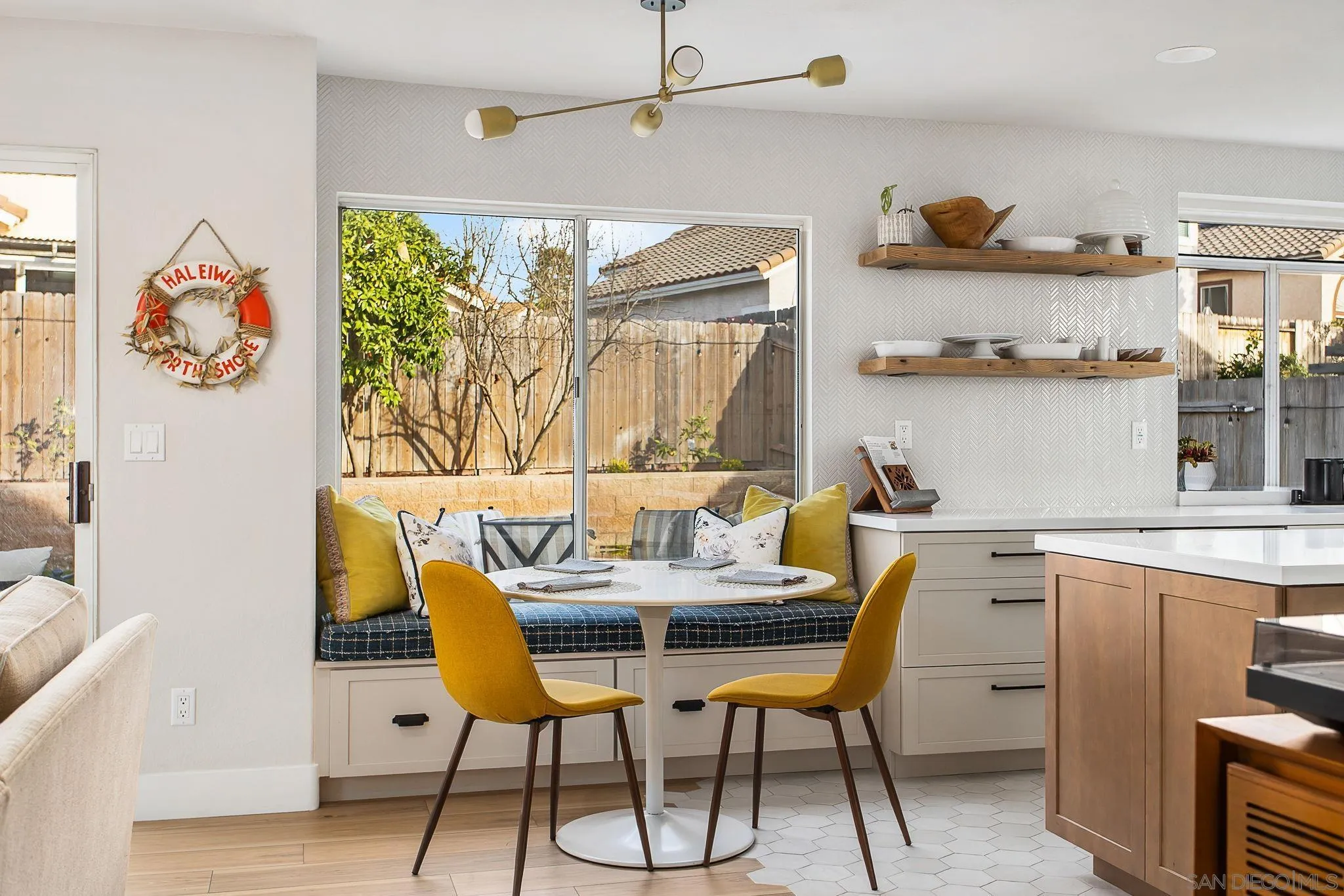 649 Mosaic Circle Oceanside, CA 92057 - Photo 15 of 52 a view of a dining room with furniture and wooden floor