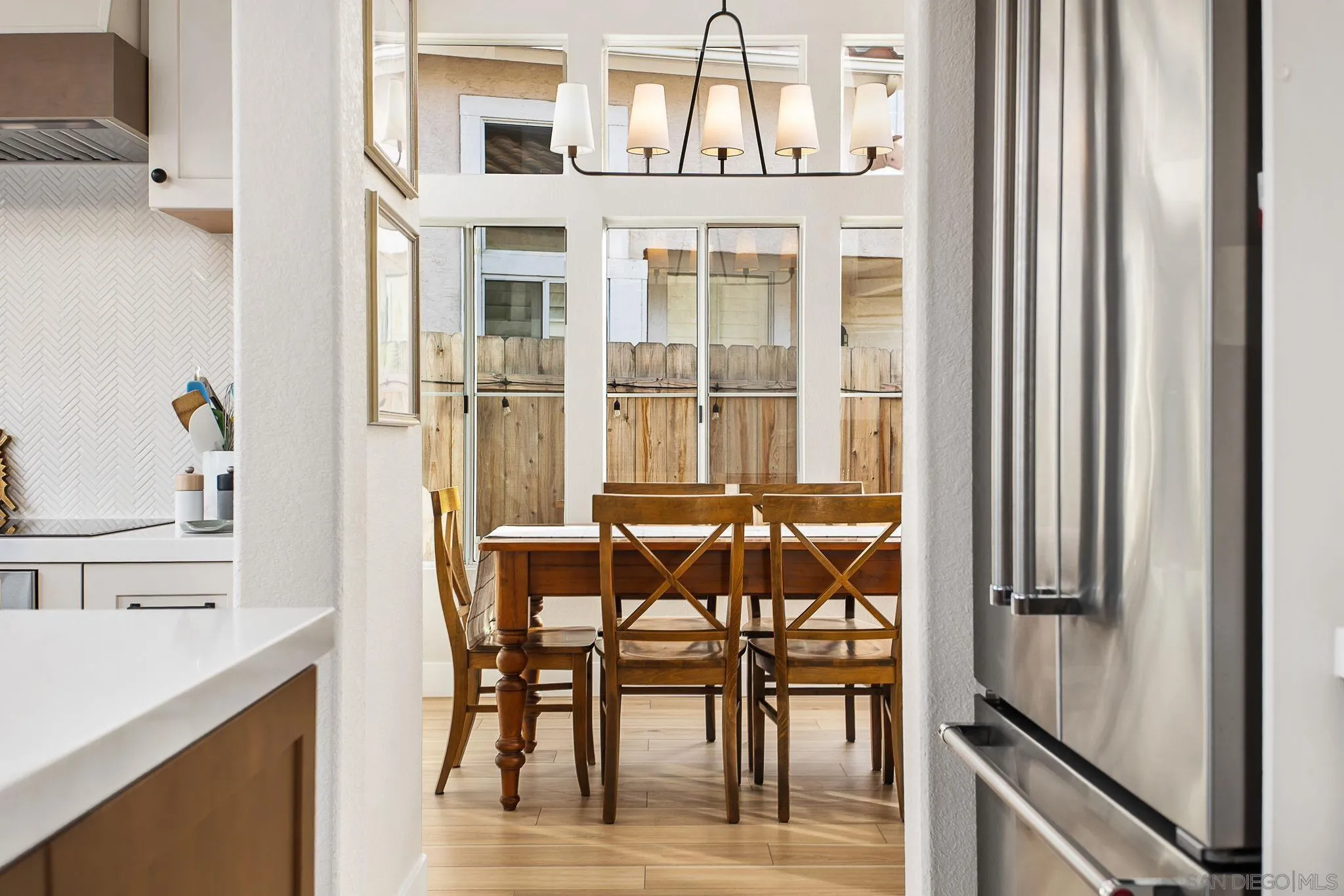 649 Mosaic Circle Oceanside, CA 92057 - Photo 16 of 52 a dining room with furniture and window