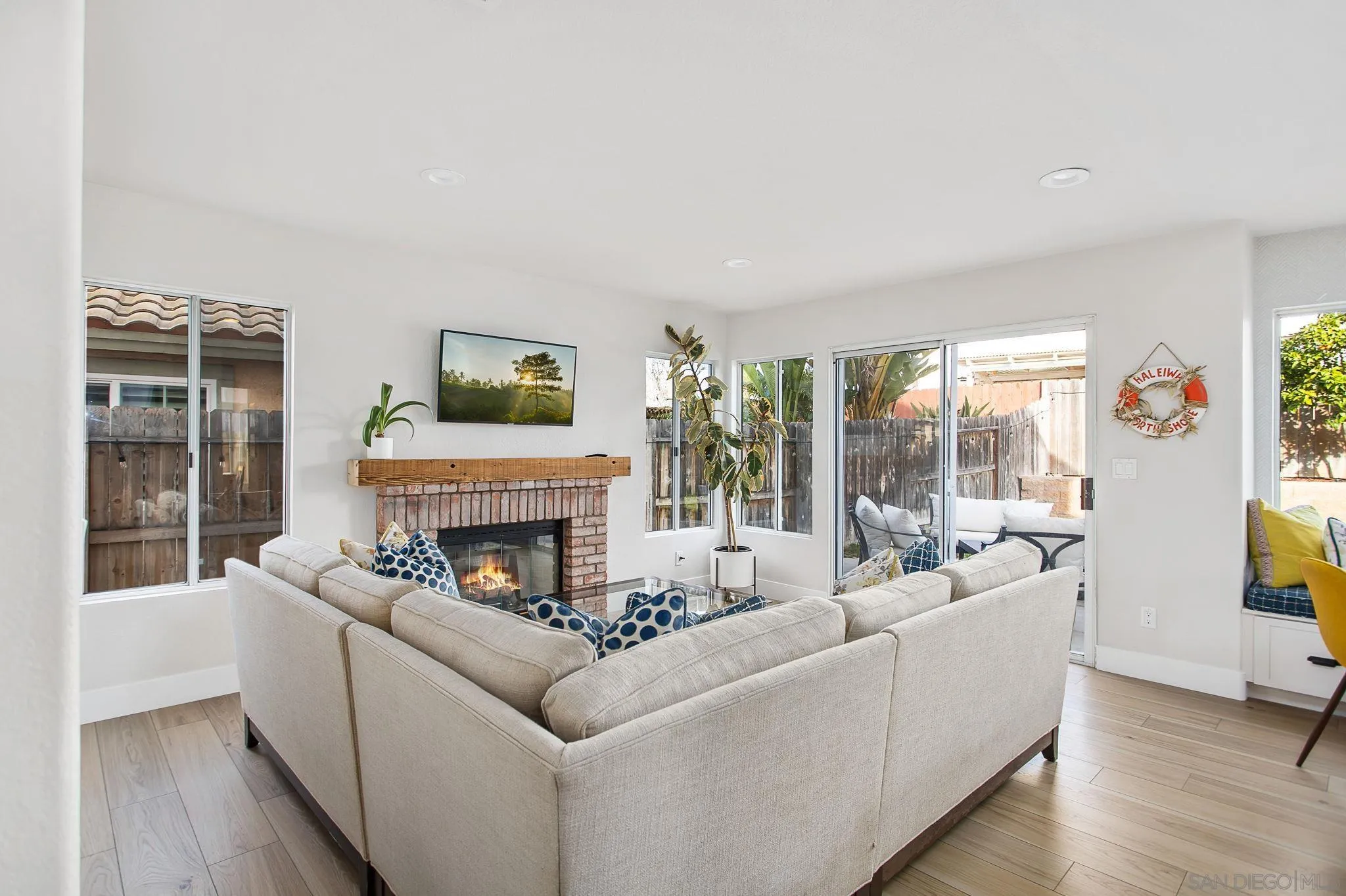 649 Mosaic Circle Oceanside, CA 92057 - Photo 17 of 52 a living room with furniture and a fireplace