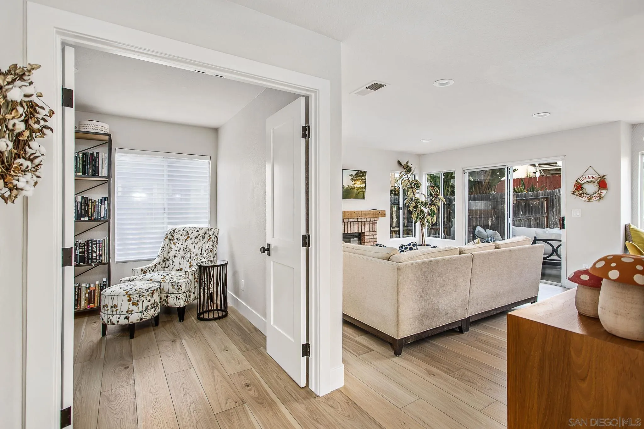 649 Mosaic Circle Oceanside, CA 92057 - Photo 20 of 52 a living room with furniture and wooden floor