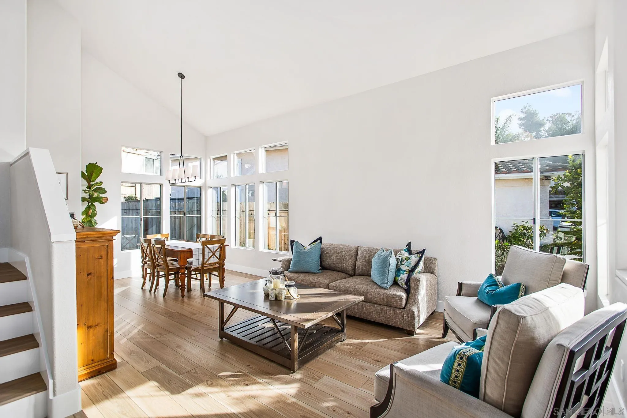 649 Mosaic Circle Oceanside, CA 92057 - Photo 4 of 52 a living room with furniture and a wooden floor