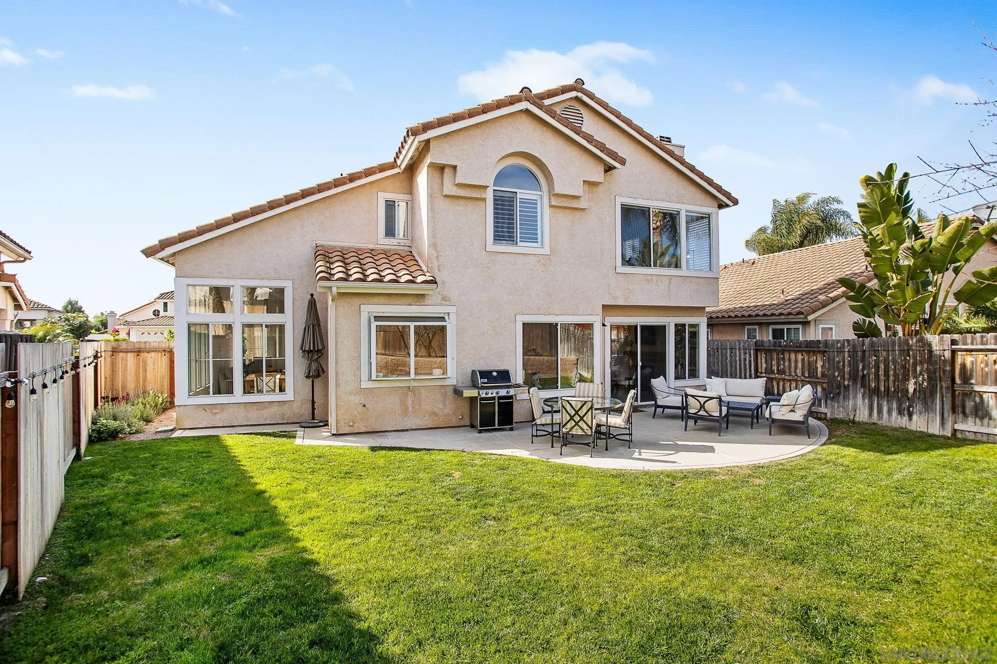 649 Mosaic Circle Oceanside, CA 92057 - Photo 46 of 52 a view of a house with a yard and sitting area