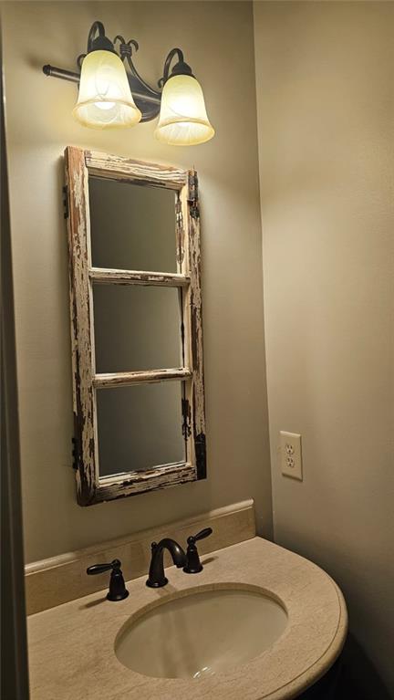 3533 Peacock Road Alpharetta, GA 30004 - Photo 12 of 21 a bathroom with a sink and mirror