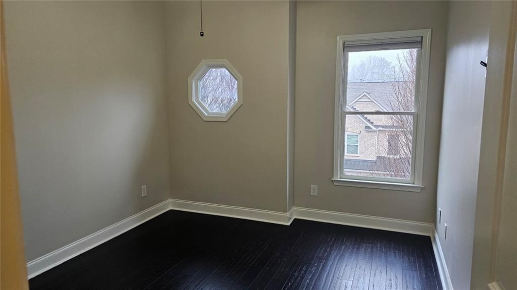 3533 Peacock Road Alpharetta, GA 30004 - Photo 15 of 21 a view of a small space with wooden floor and a window