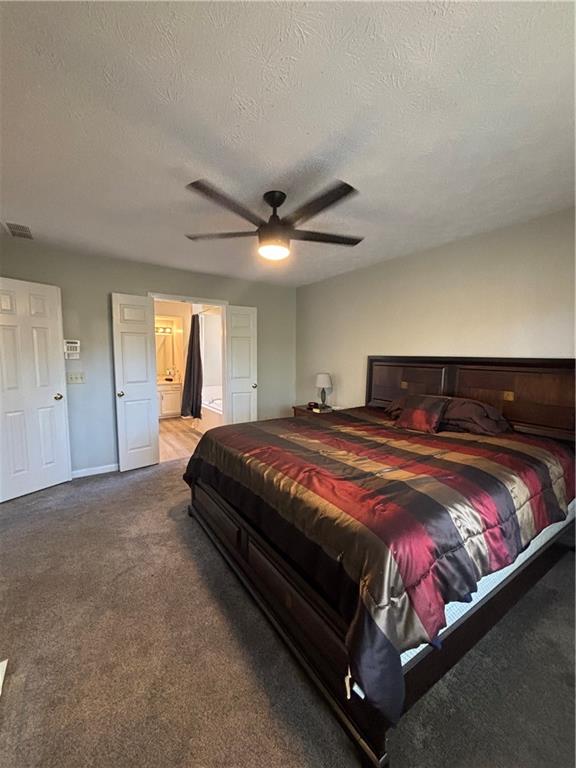 4949 Penscot Way Stone Mountain, GA 30088 - Photo 27 of 40 a bedroom with a bed and window