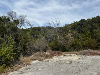a view of a yard covered in snow