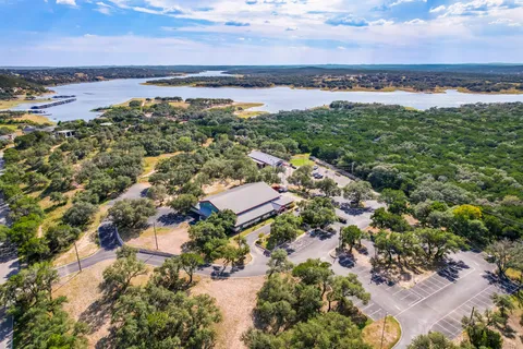 a aerial view of a house with a yard
