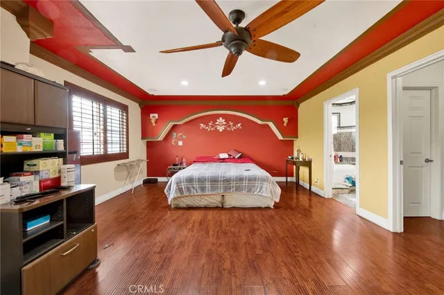 a kitchen with stainless steel appliances granite countertop a refrigerator a sink a stove and chairs