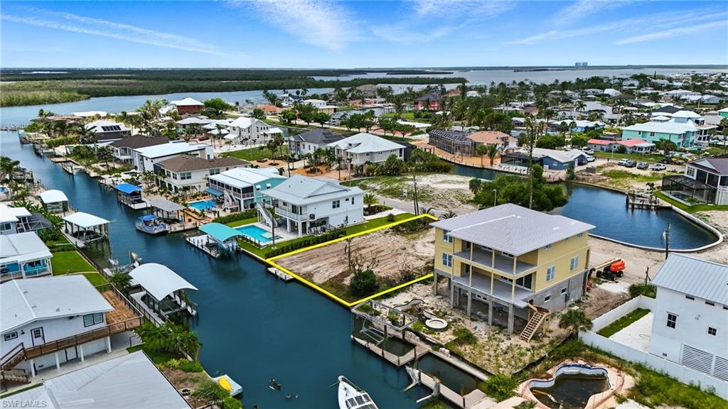 21730 Madera Road Fort Myers Beach, FL 33931 - Photo 5 of 14 an aerial view of residential houses with outdoor space