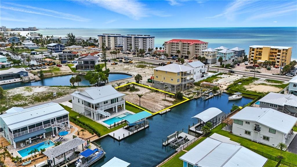 21730 Madera Road Fort Myers Beach, FL 33931 - Photo 6 of 14 an aerial view of a houses with outdoor space