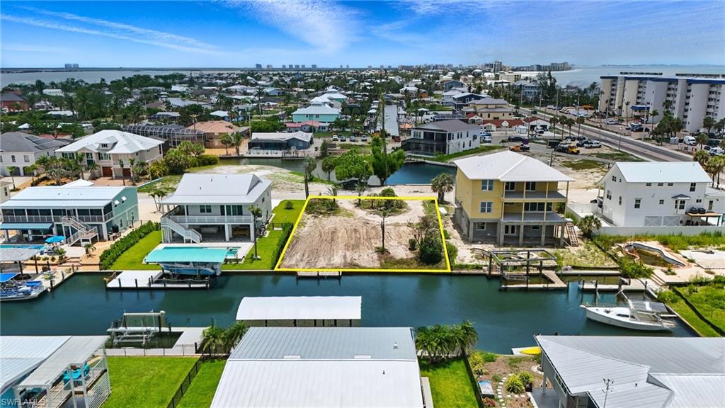 21730 Madera Road Fort Myers Beach, FL 33931 - Photo 7 of 14 an aerial view of a houses with a lake view