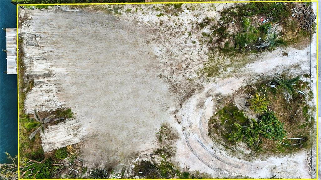 21730 Madera Road Fort Myers Beach, FL 33931 - Photo 8 of 14 a view of a yard in a garden