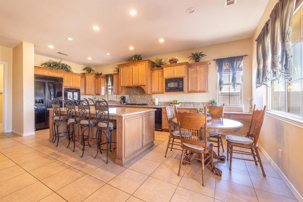 19506 Arcata Road Apple Valley, CA 92307 - Photo 3 of 34 Expansive kitchen featuring generous space and a dedicated dining area, perfect for everyday living