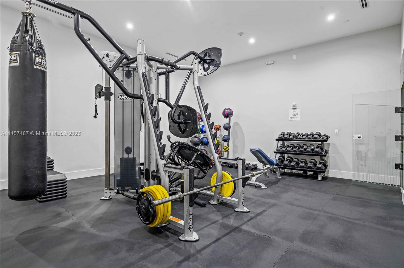 801 Brickell Key Boulevard, Unit 2208 Miami, FL 33131 - Photo 19 of 22 a view of a room with gym equipment