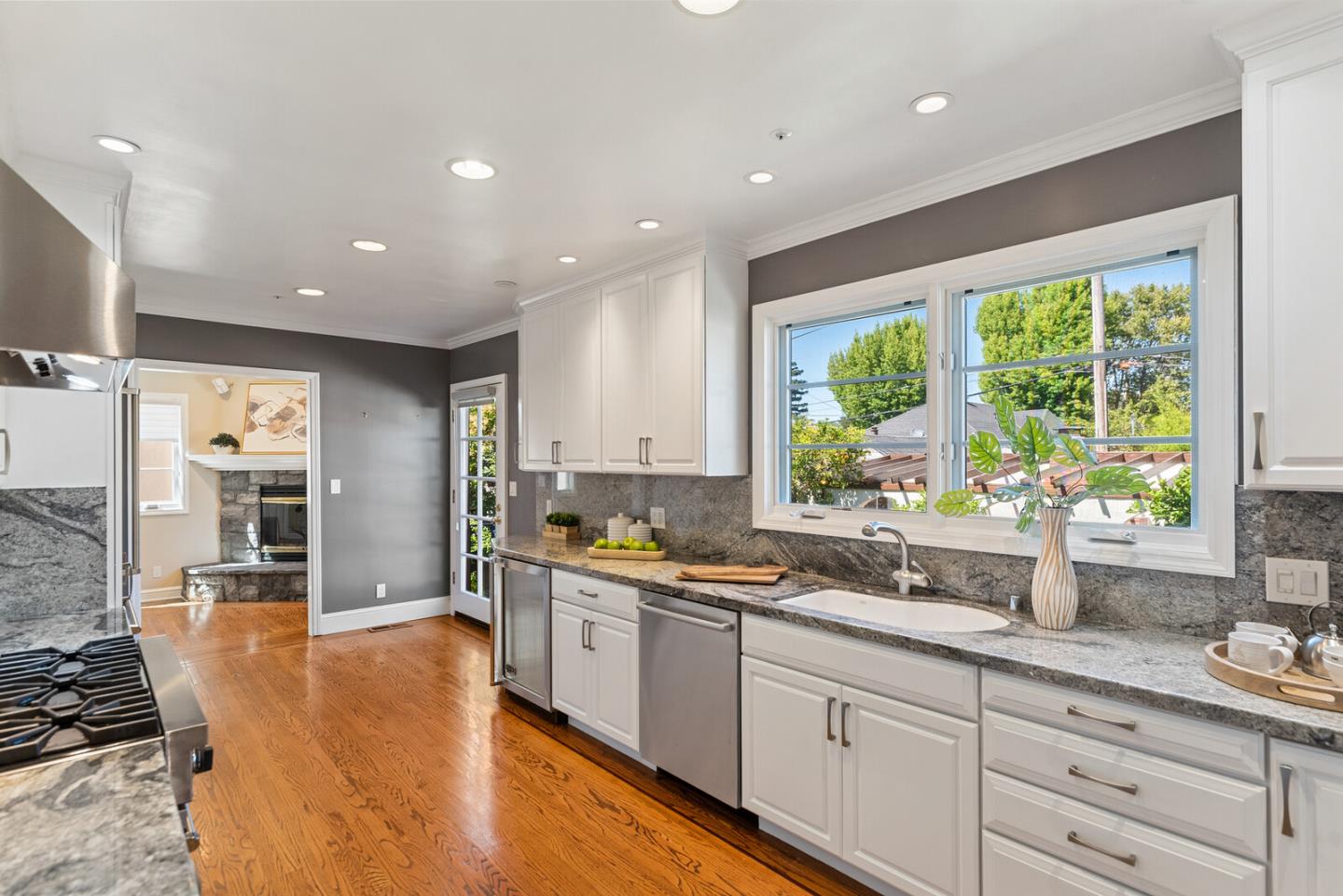 1416 Columbus Avenue Burlingame, CA 94010 - Photo 13 of 39 a large kitchen with kitchen island a large window in it