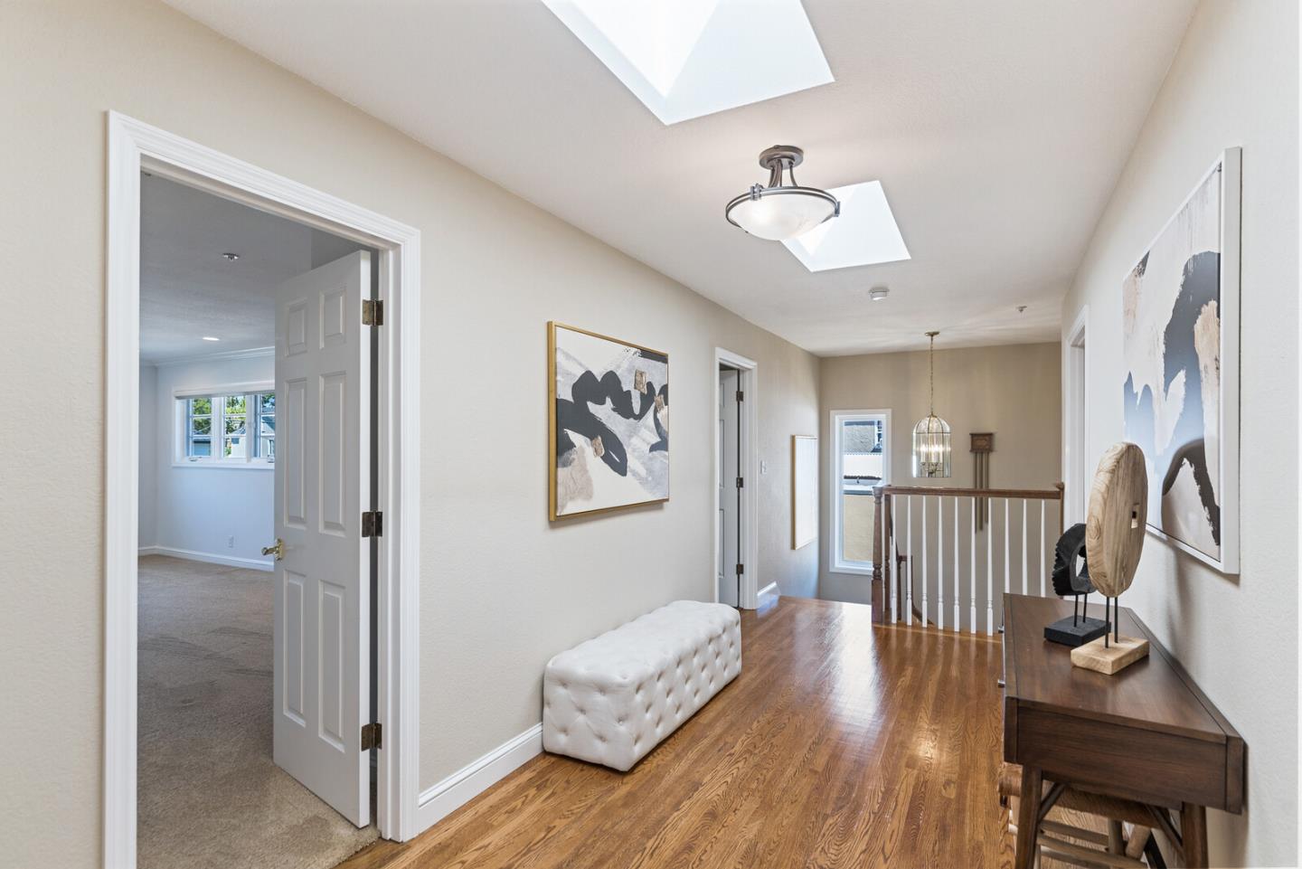 1416 Columbus Avenue Burlingame, CA 94010 - Photo 23 of 39 a living room with furniture and a wooden floor