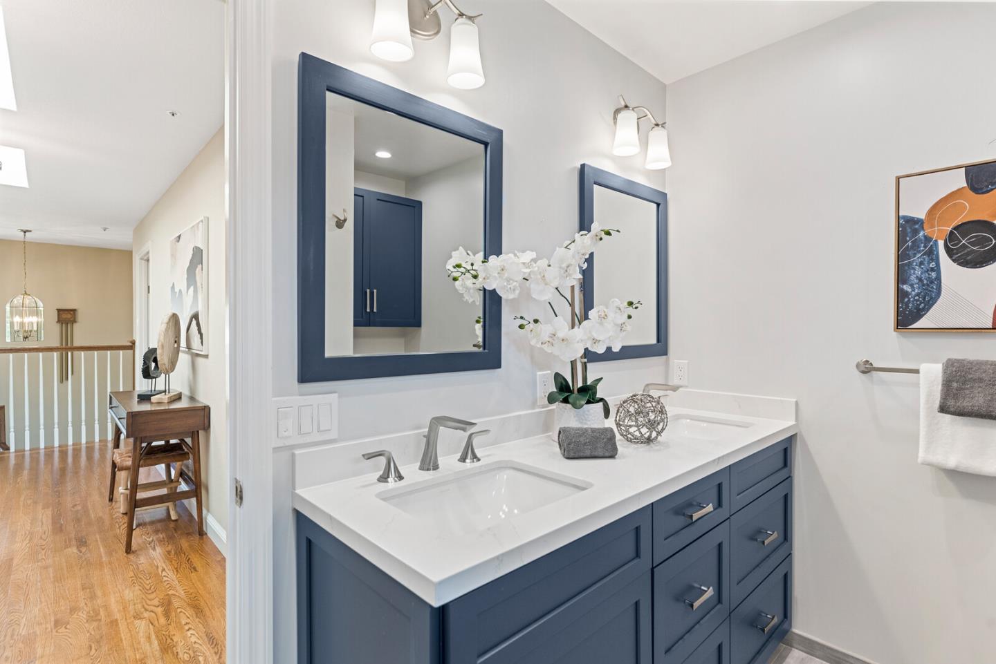 1416 Columbus Avenue Burlingame, CA 94010 - Photo 31 of 39 a bathroom with a sink and a mirror