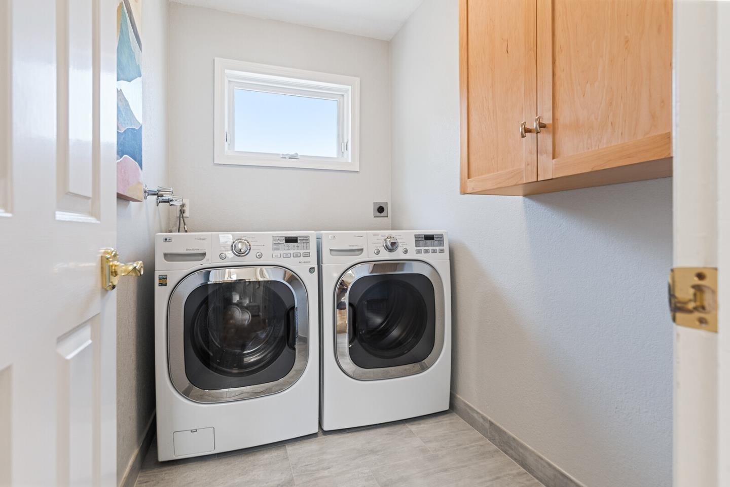 1416 Columbus Avenue Burlingame, CA 94010 - Photo 35 of 39 a utility room with dryer and washer