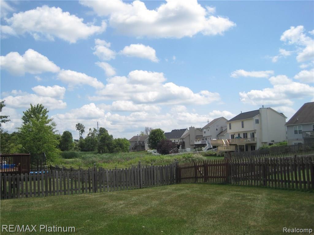 2756 Laurel Ridge Lane Howell, MI 48843 - Photo 8 of 18 common area view/ fenced yard!