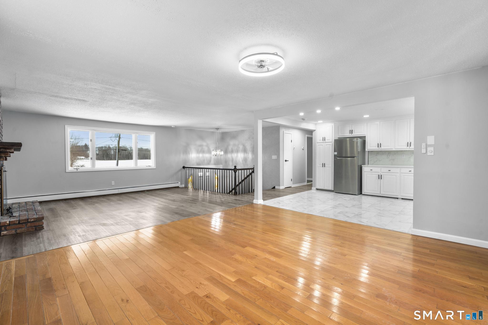 133 Phelps Road East Windsor, CT 06088 - Photo 11 of 40 a view of kitchen with refrigerator and windows