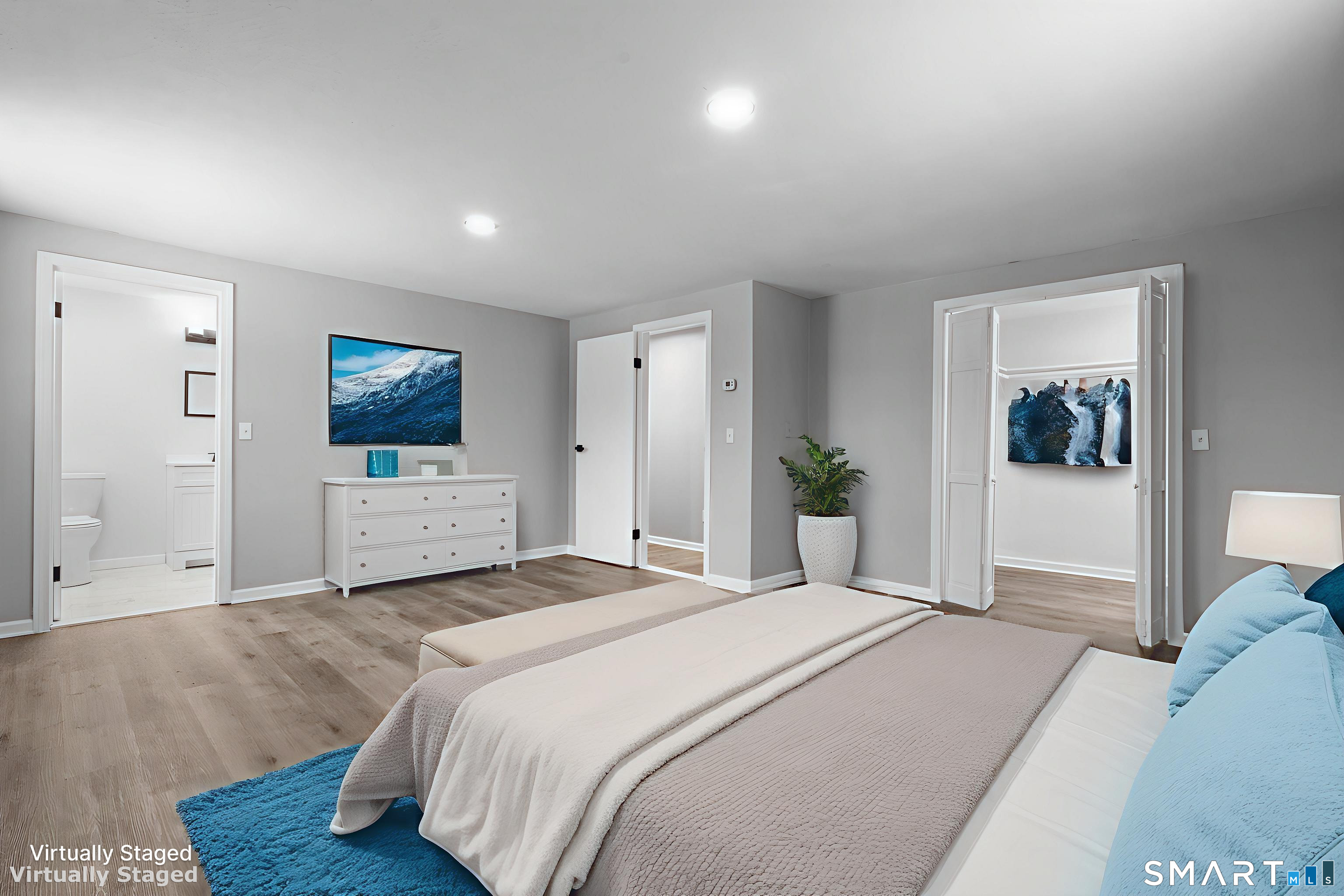 133 Phelps Road East Windsor, CT 06088 - Photo 27 of 40 a spacious bedroom with a bed and a flat screen tv