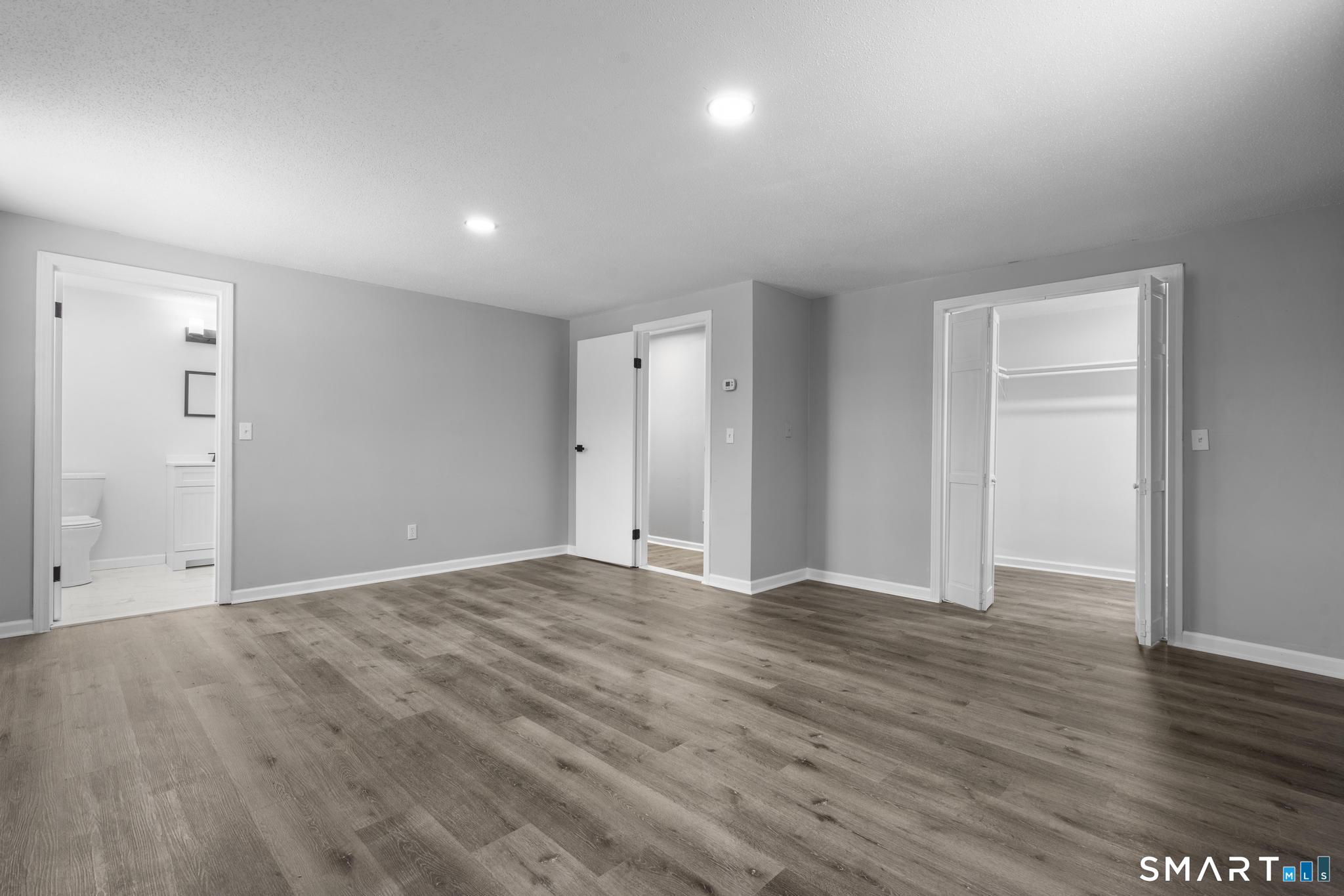 133 Phelps Road East Windsor, CT 06088 - Photo 28 of 40 a view of an empty room with wooden floor