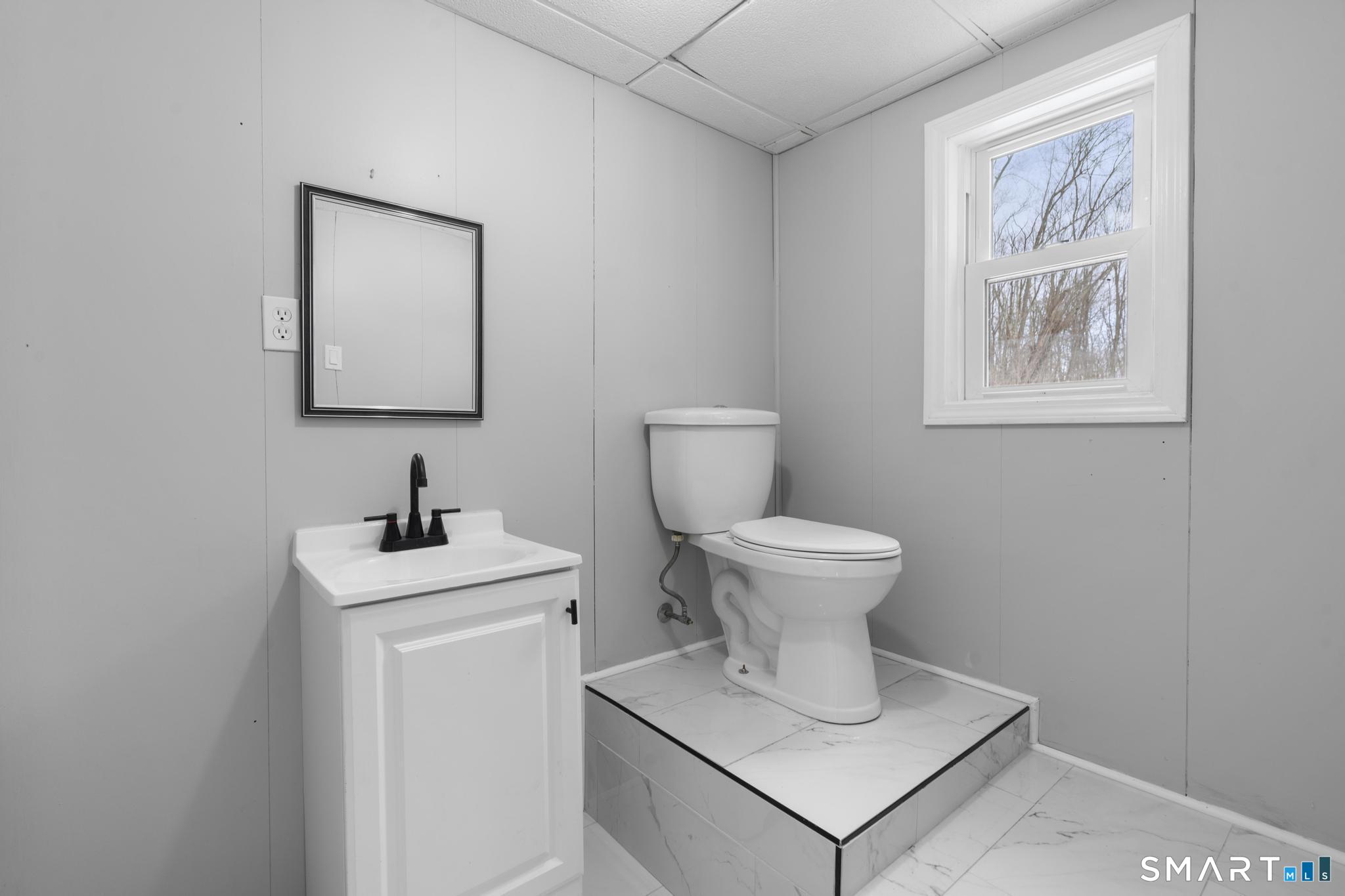 133 Phelps Road East Windsor, CT 06088 - Photo 34 of 40 a bathroom with a toilet and sink