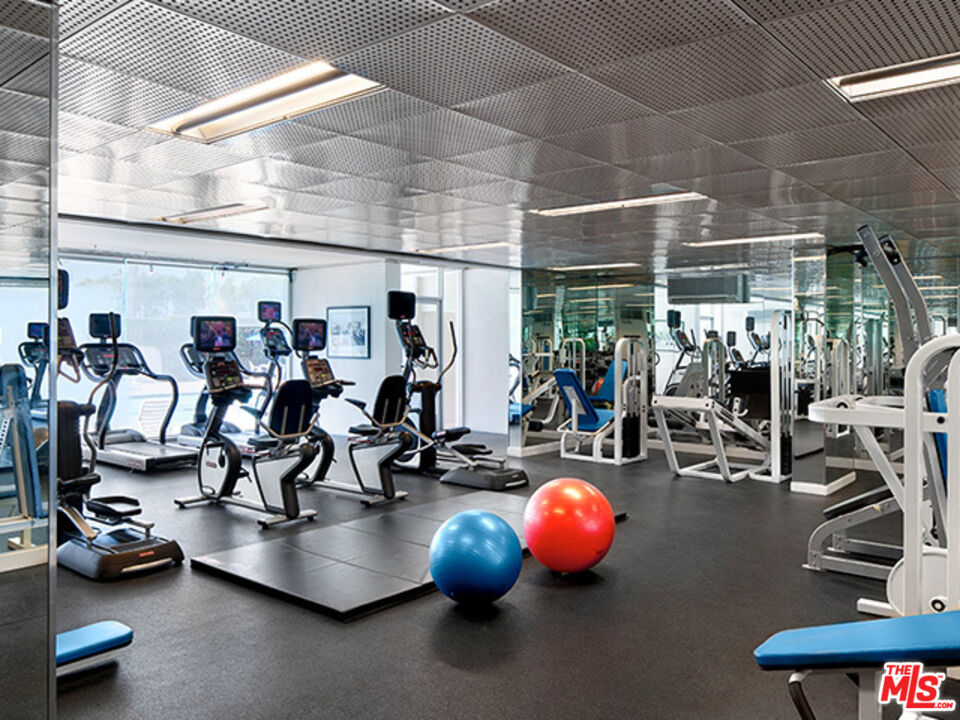2700 Neilson Way, Unit 435 Santa Monica, CA 90405 - Photo 15 of 28 a view of a room with gym equipment