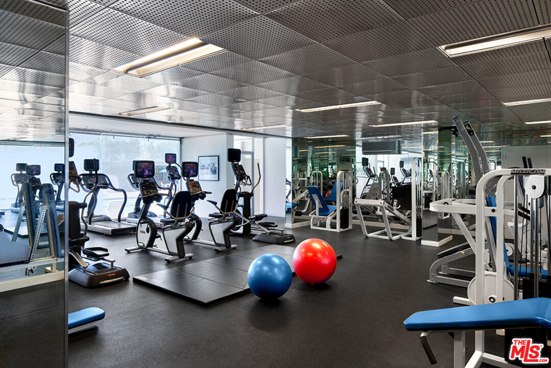 2700 Neilson Way, Unit 435 Santa Monica, CA 90405 - Photo 9 of 28 a view of a room with gym equipment