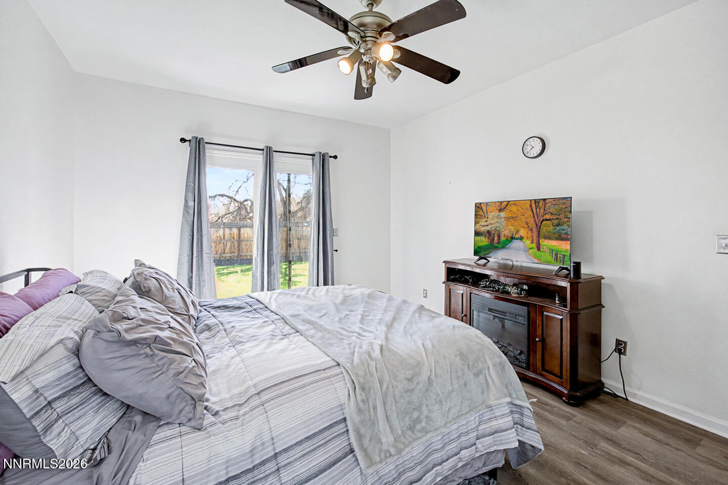 1284 Eider Circle Fallon, NV 89406 - Photo 13 of 21 a bedroom with a bed and a flat screen tv