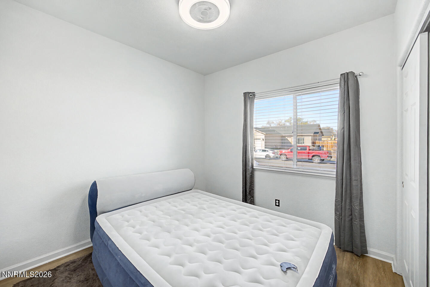1284 Eider Circle Fallon, NV 89406 - Photo 5 of 21 a bedroom with a bed and painting on the wall
