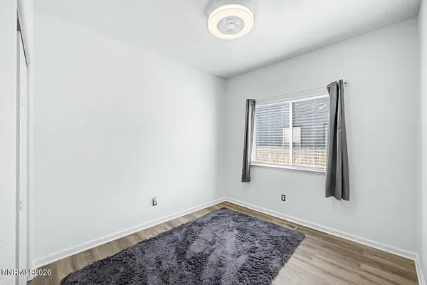 a view of a room with a window