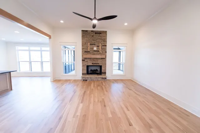 a view of livingroom with hardwood floor and a ceiling fan