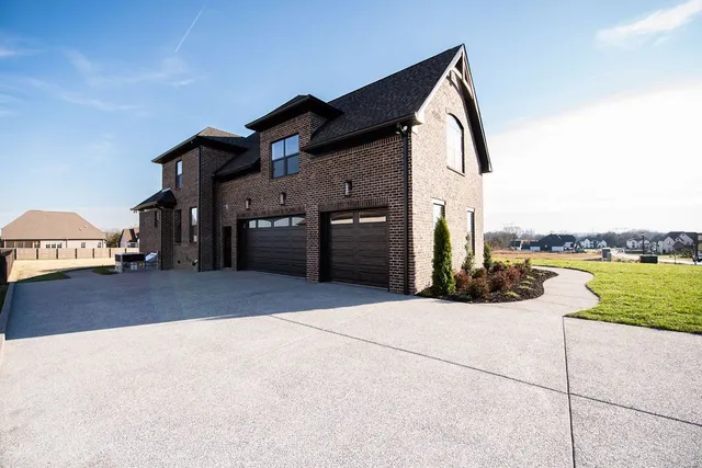 a view of a patio with a yard