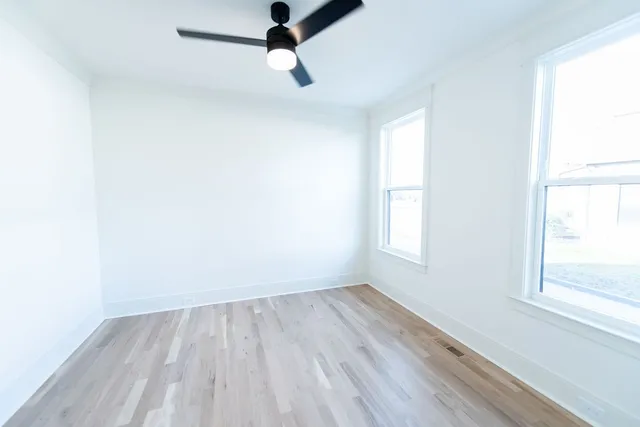 an empty room with windows