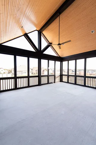a view of an empty room with a balcony