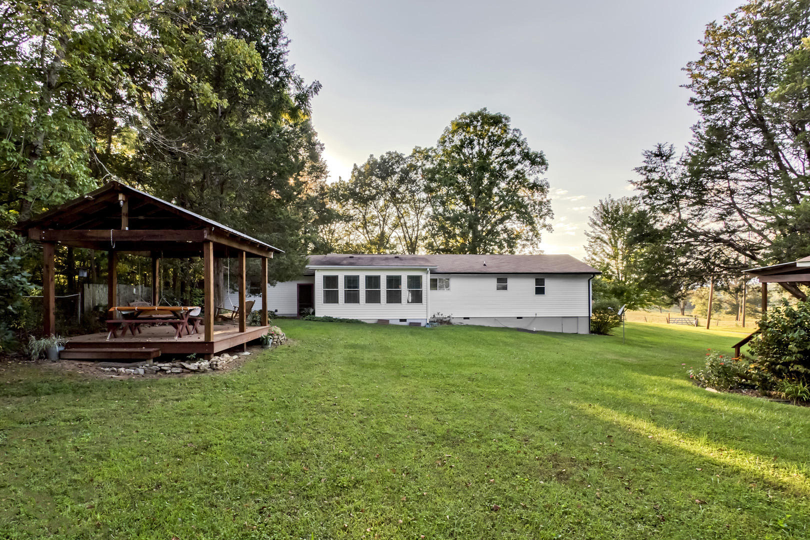 1420 Adams Road Strawberry Plains, TN 37871 - Photo 31 of 36 31_AdamsRoad_1420_Backyard