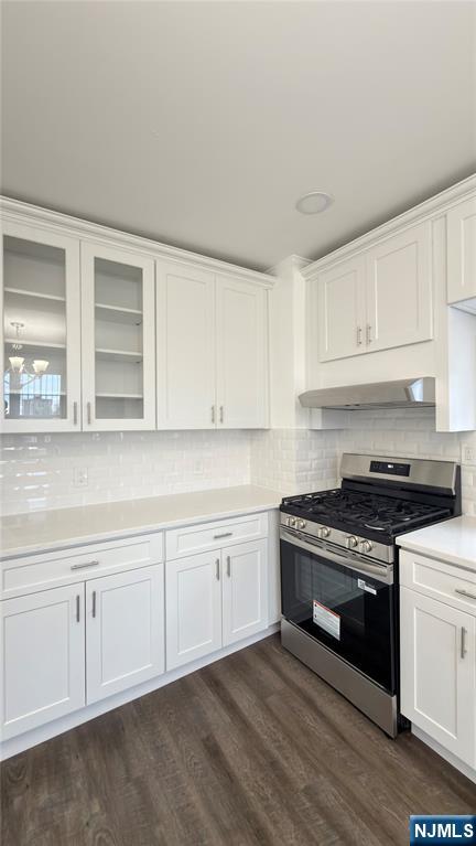 376 Delano Place, Unit 2 Fairview, NJ 07022 - Photo 16 of 21 a kitchen with granite countertop white cabinets and appliances