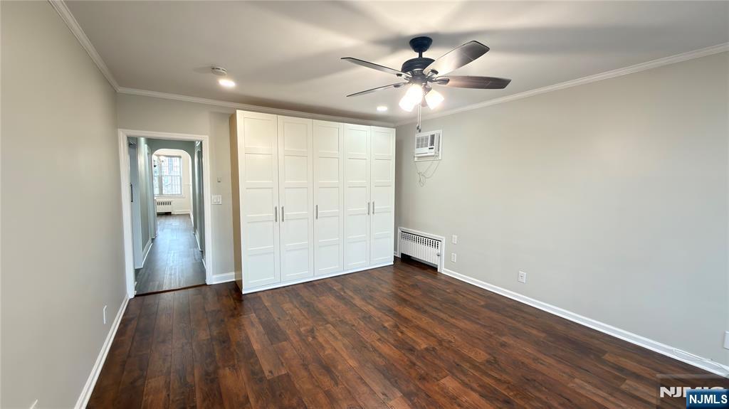376 Delano Place, Unit 2 Fairview, NJ 07022 - Photo 21 of 21 a view of an empty room with wooden floor