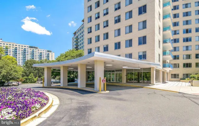 a view of a building with a garden
