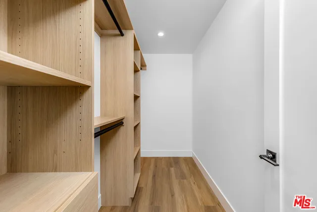 a bathroom with a tub and shower